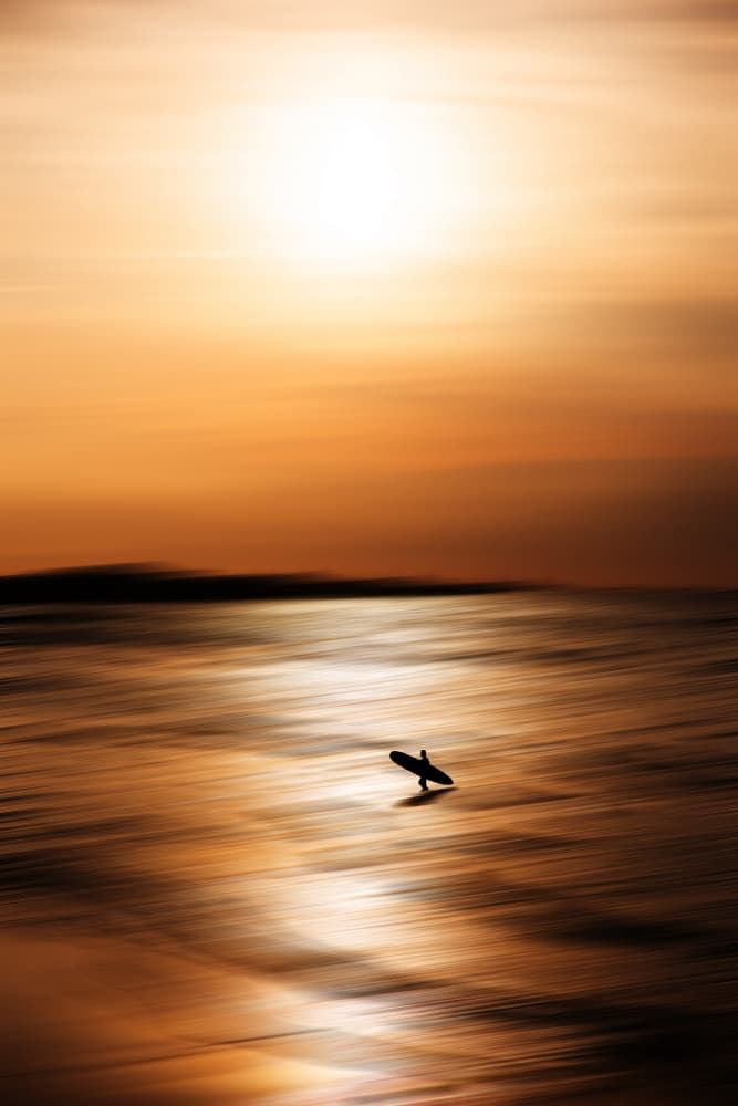 Lone Surfer Sunset by AN POTO — canvas wall art