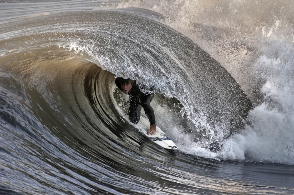 Surfer In The Barrel by Claudio Moretti — canvas wall art