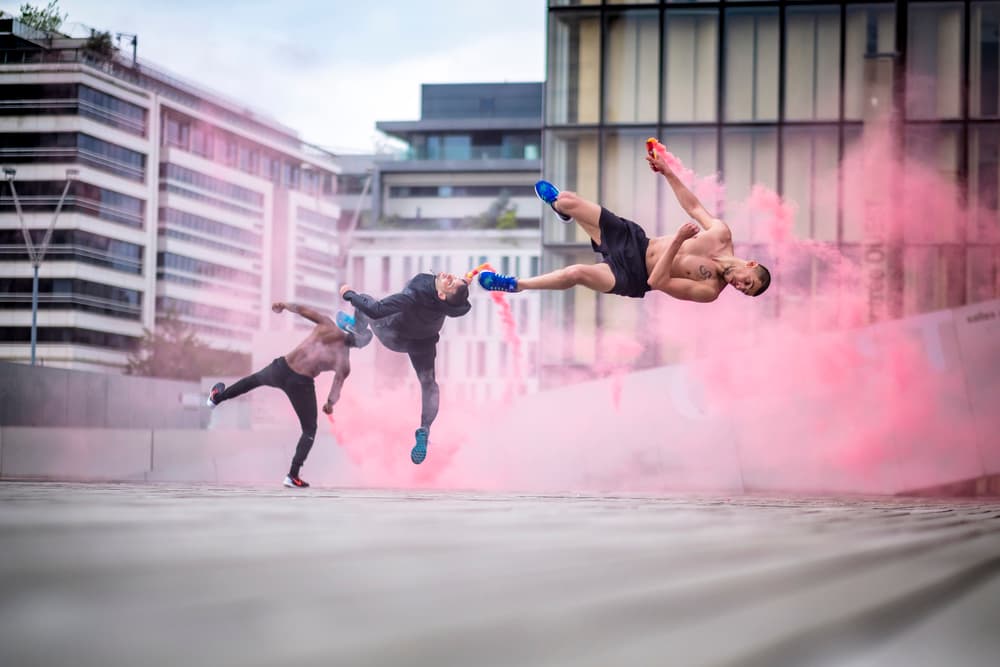 Pink Smoke Parkour Jump by Tristan Shu — canvas wall art