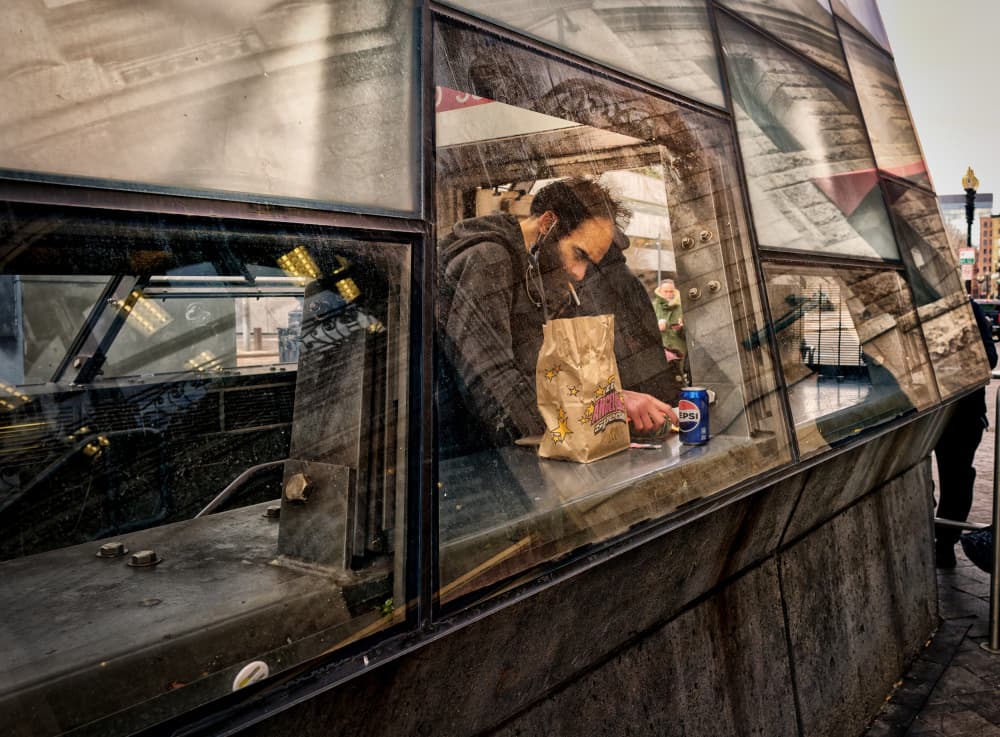 Man Eating City Reflections by John Hoey — canvas wall art