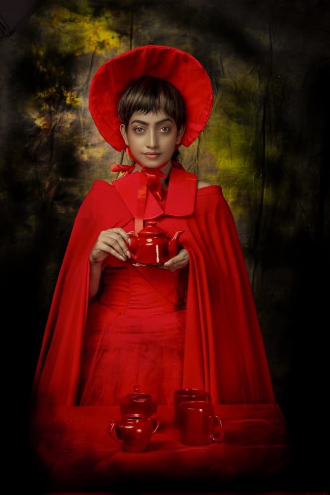 Red Cape Tea Party by DEBASISH CHATTOPADHYAY — canvas wall art