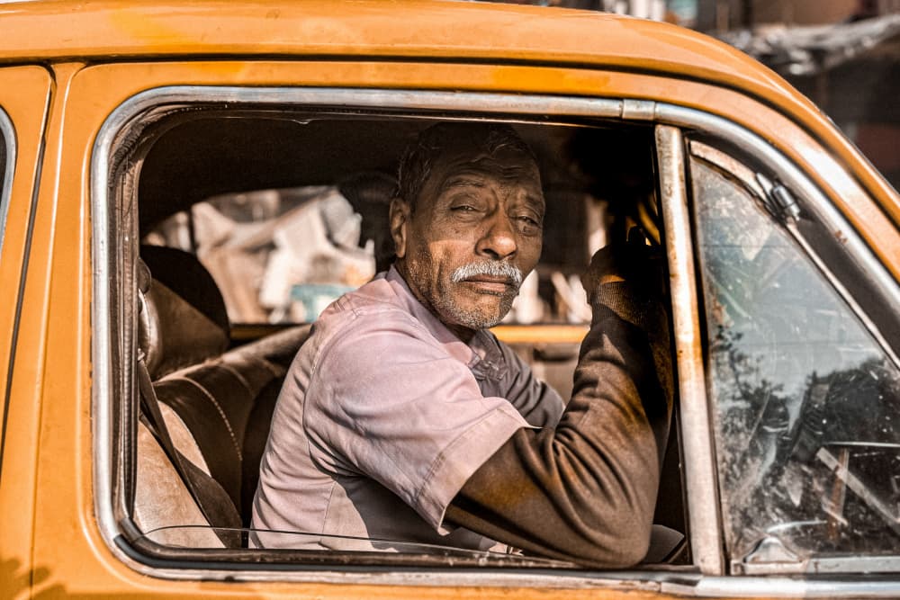 Pensive Taxi Driver by Subhajit Das — canvas wall art