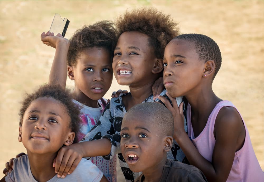 Joyful Group of Kids by Jean Vandijck — canvas wall art