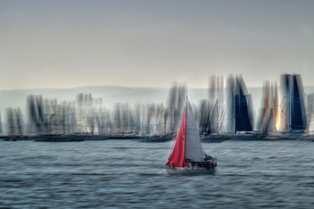 Red Sailboat Motion by Milan Malovrh — canvas wall art