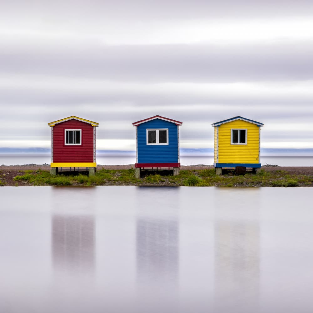 Colorful Huts Reflections by Raimondo Restelli — canvas wall art