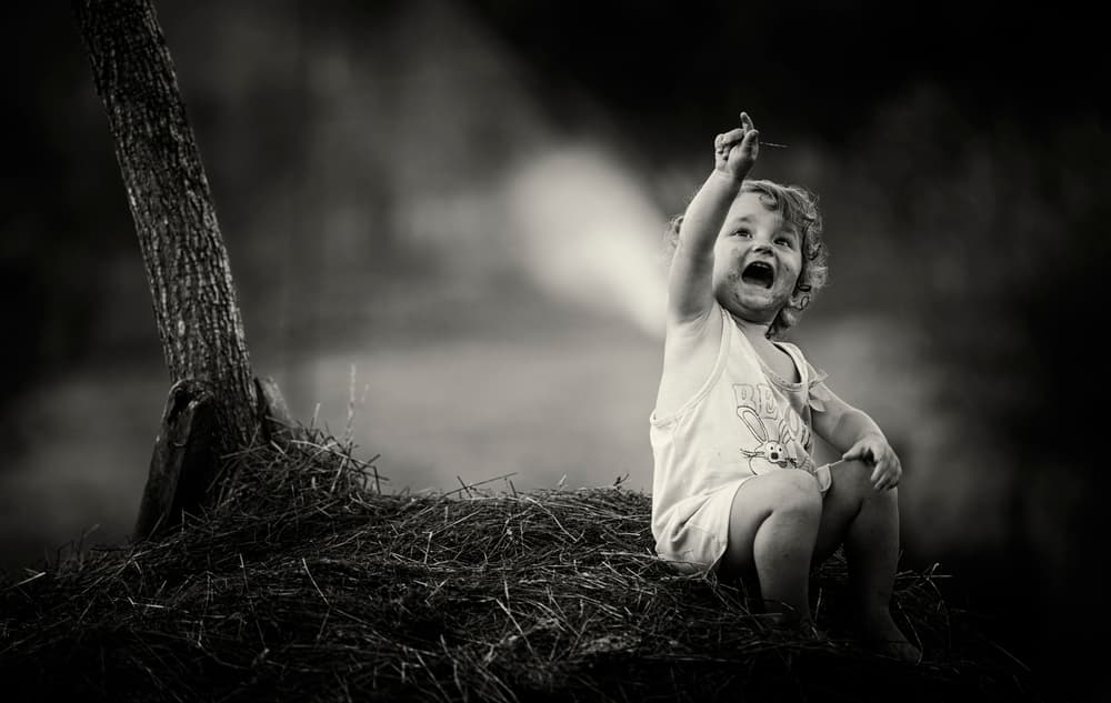 Joyful Child Reaching Up by Julien Oncete — canvas wall art