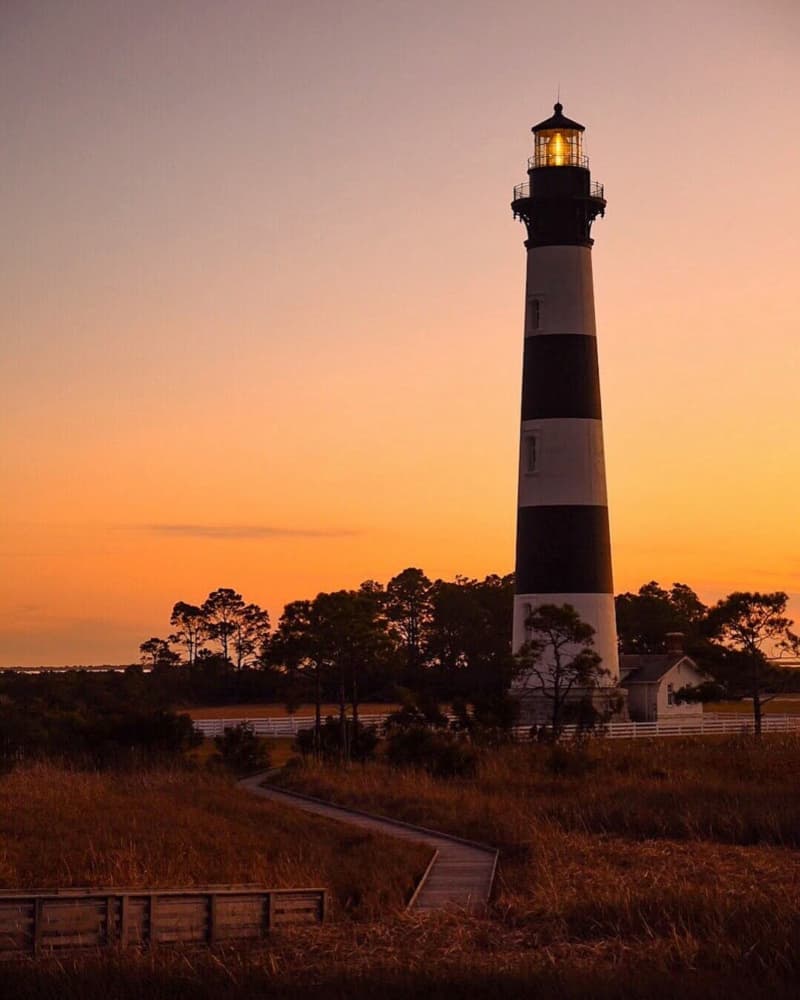 Bodie Island Sunset Lighthouse by Del Mundo Imagery — canvas wall art