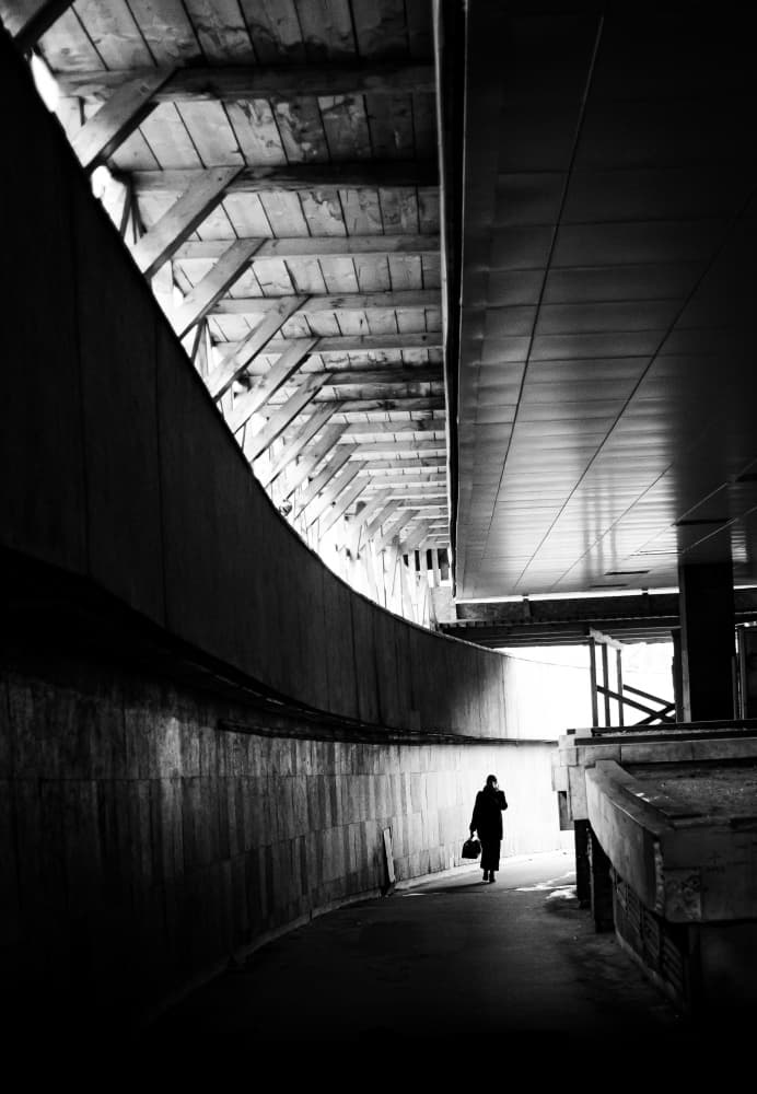 Lone Figure Towards Light by Andreas Timar — canvas wall art