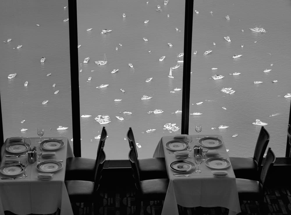 Dining Over Busy Waters by Liyun Yu — canvas wall art