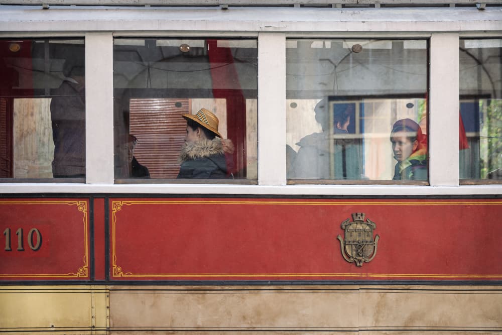 Vintage Tram Passengers by Roswitha Schleicher-Schwarz — canvas wall art