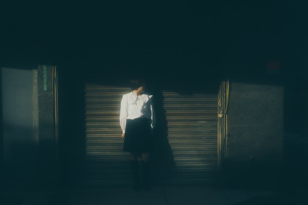 Pensive Woman Urban Light by yuimei — canvas wall art