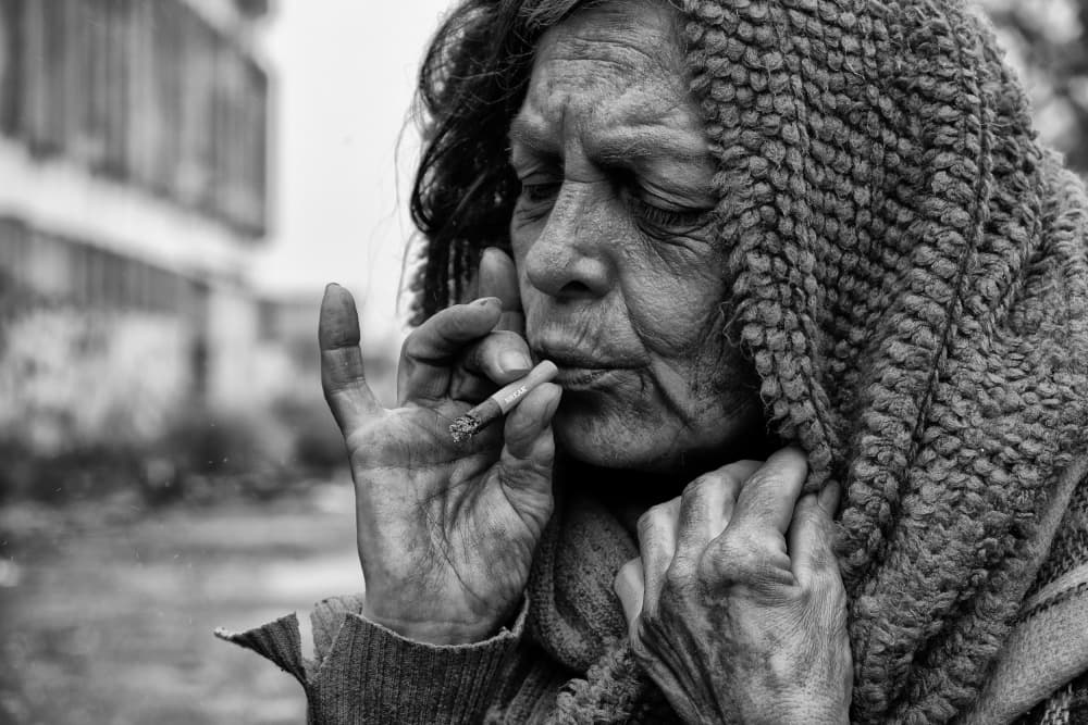 Pensive Woman Smoking by Josefina Melo — canvas wall art