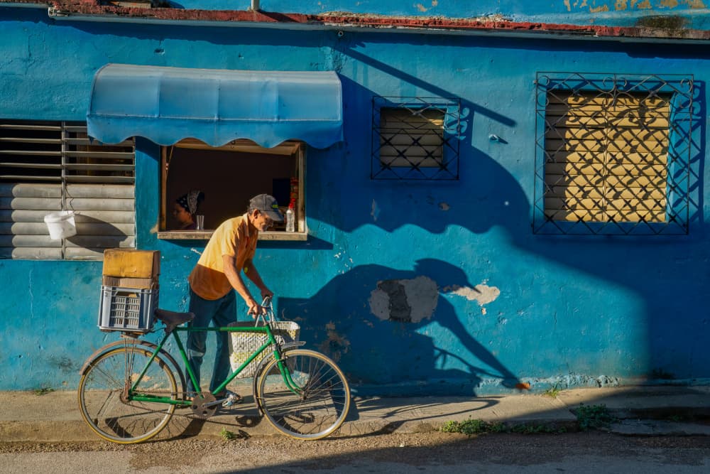 Blue Wall Bicycle Scene by Hanping Xiao — canvas wall art