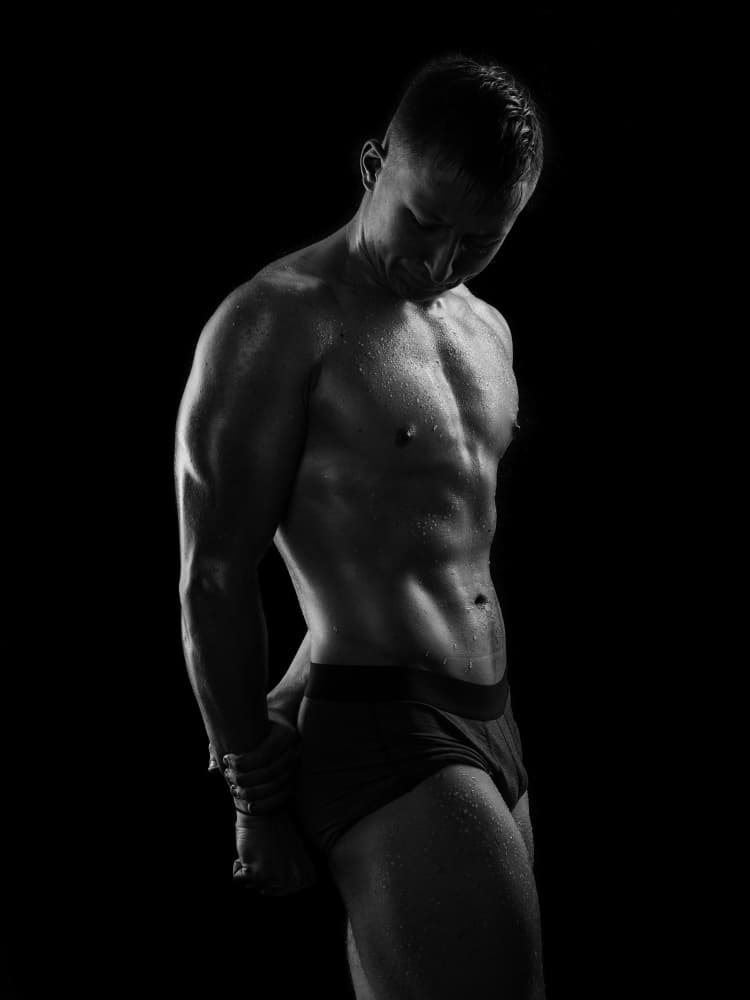 Dramatic Muscular Man by Michael Allmaier — canvas wall art