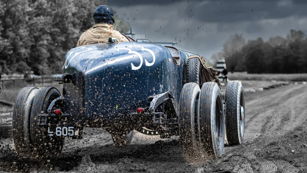 Vintage Race Car Action by Peter Elling-Jordt — canvas wall art