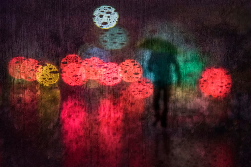 Person In Rainy City by Ekkachai Khemkum — canvas wall art