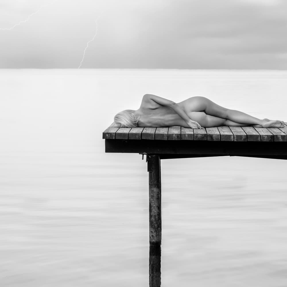 Nude Woman Pier Lightning by Paulius Stefanovicius — canvas wall art