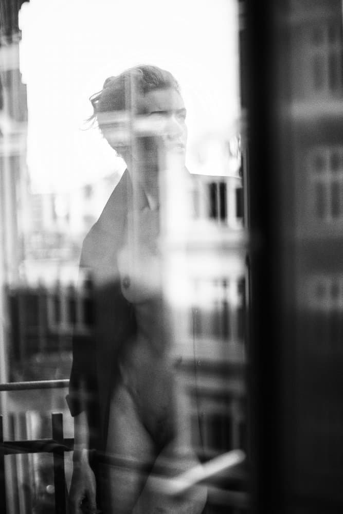 Pensive Window Reflection by Lukas Kaminski — canvas wall art