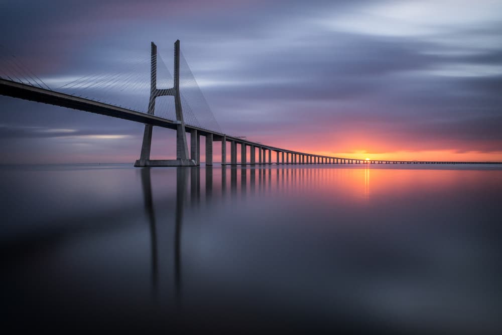 Long Bridge Sunset Reflection by Ricardo Mateus — canvas wall art