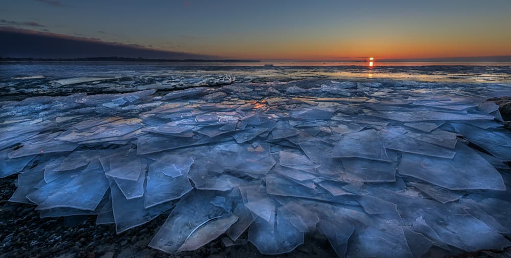Frozen Lake Sunset by Susan Breau — canvas wall art