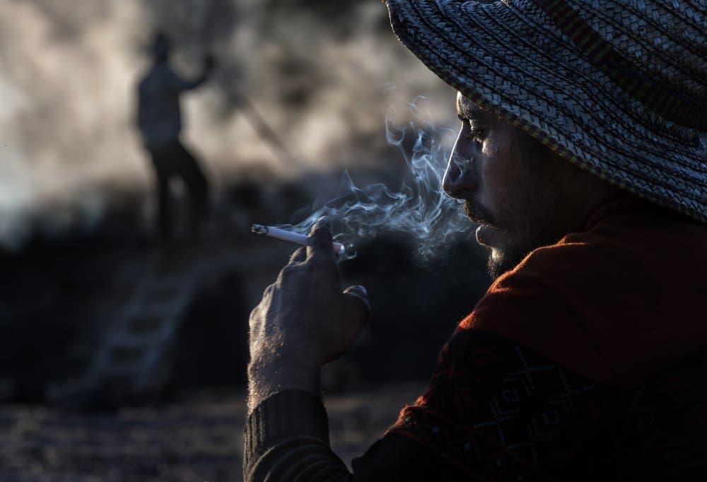 Thoughtful Man Smoking by durmusceylan — canvas wall art