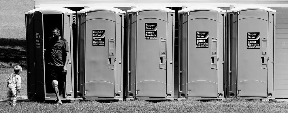 Father Son Toilet Stop by Jian Wang — canvas wall art