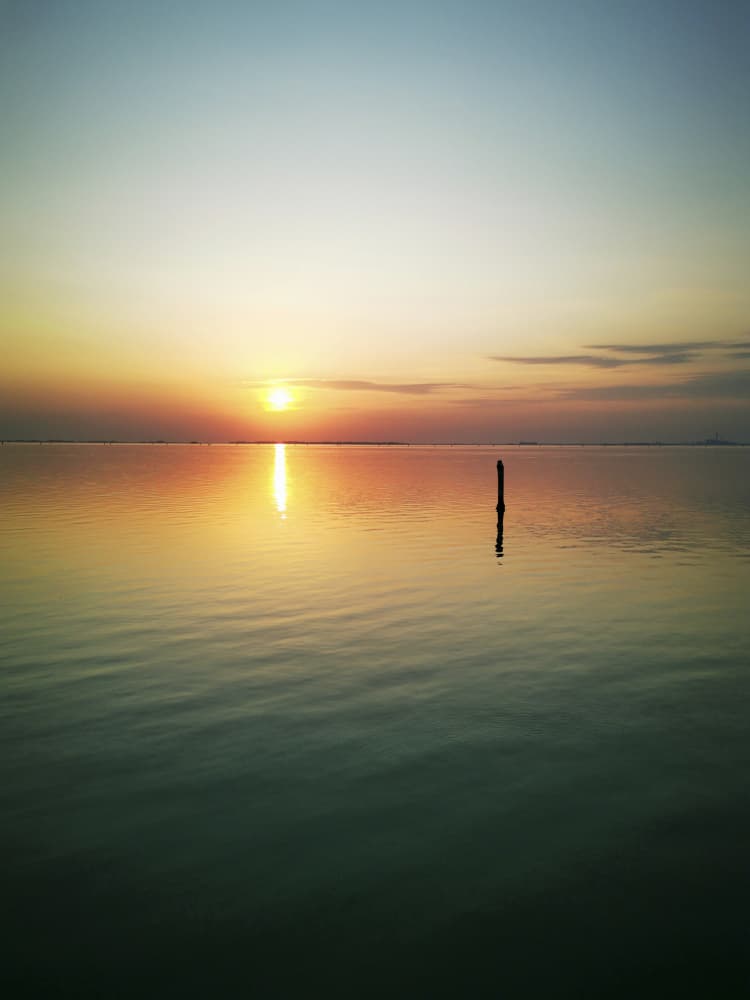 Golden Sunset Reflection by Angelo Cerantola — canvas wall art
