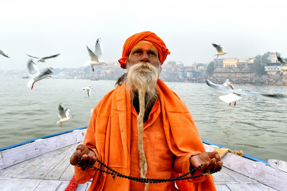 Ganges Sadhu with Birds by Shaibal Nandi — canvas wall art