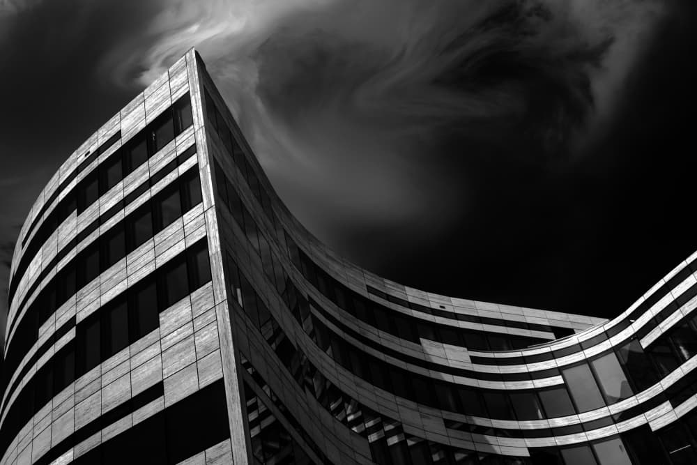 Curved Building Dark Sky by Gilbert Claes — canvas wall art