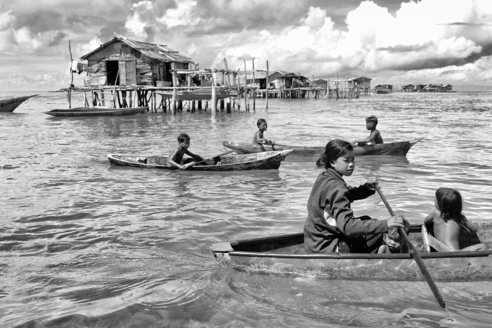 Children of the Stilt Village by Kieron Long — canvas wall art