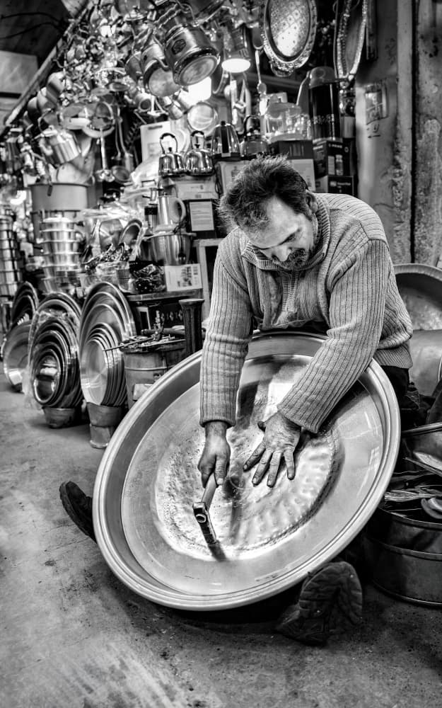 Coppersmith at Work by Bashar Alsofey — canvas wall art