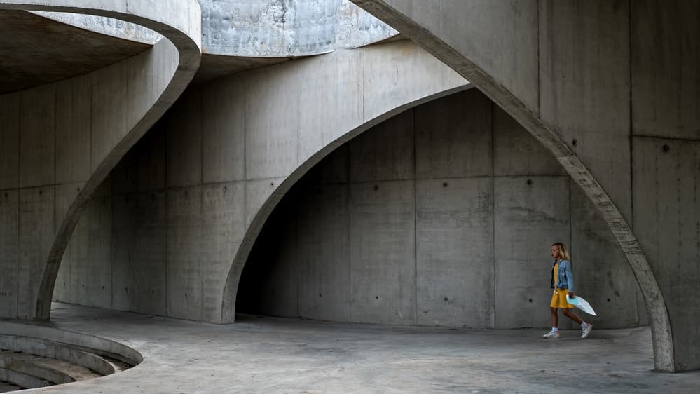 Woman In Concrete Arches by Lus Joosten — canvas wall art