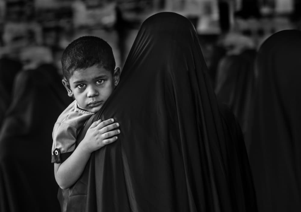 Solemn Child's Gaze by Ali Al-Jazeri — canvas wall art