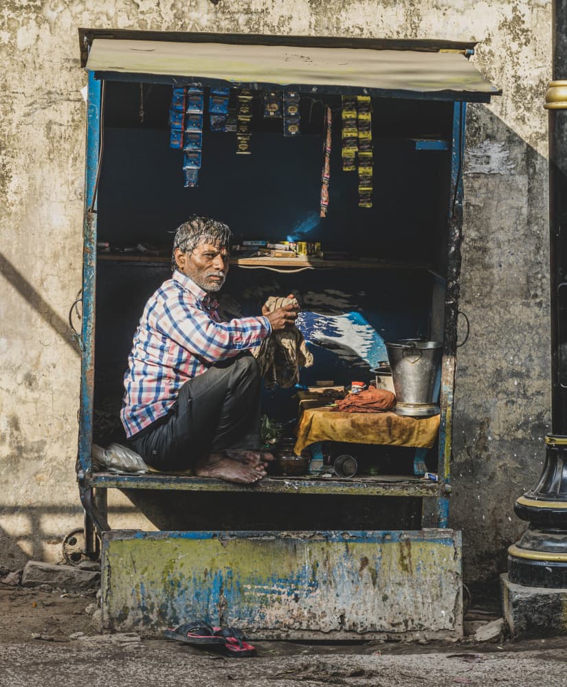Indian Street Shopkeeper by Samara Ratnayake — canvas wall art