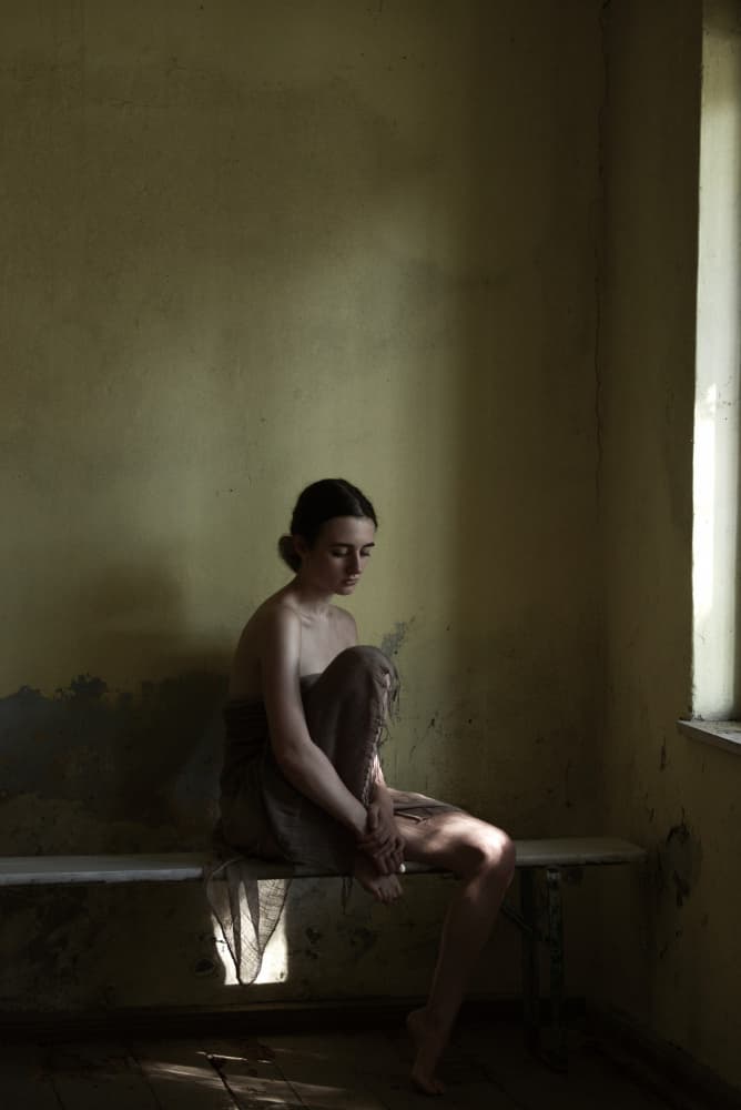 Pensive Woman In Light by Małgorzata Masarz — canvas wall art