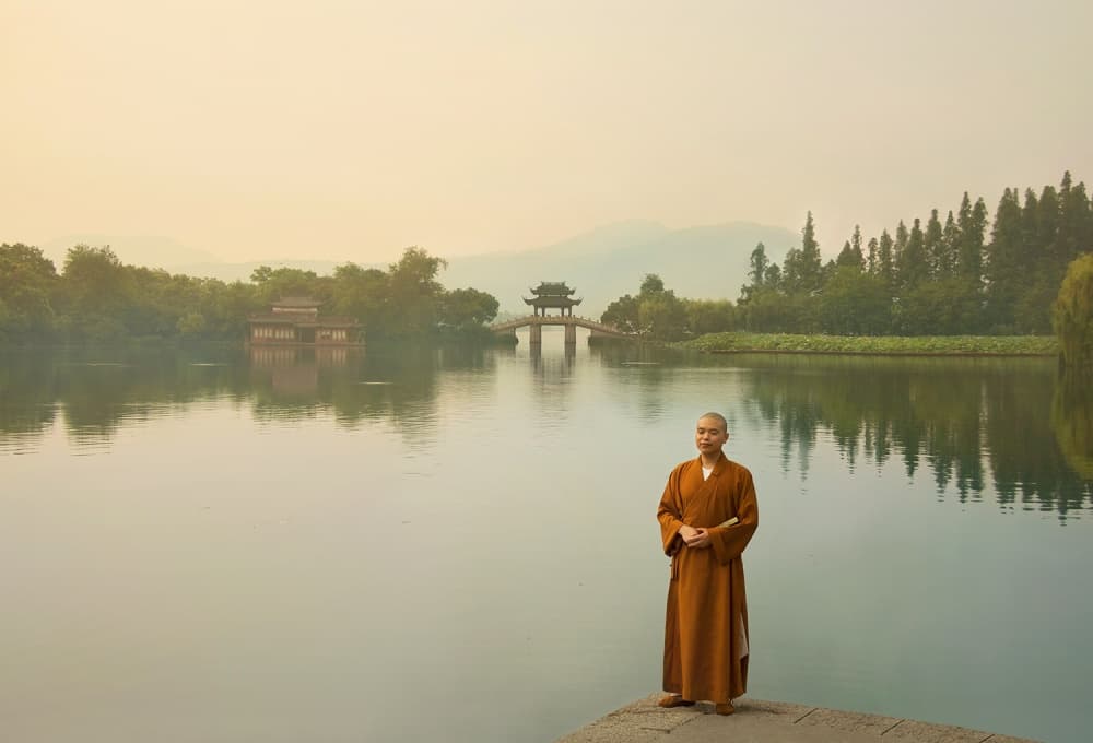 Serene Monk By Lake by Ivaylo and Teodora — canvas wall art