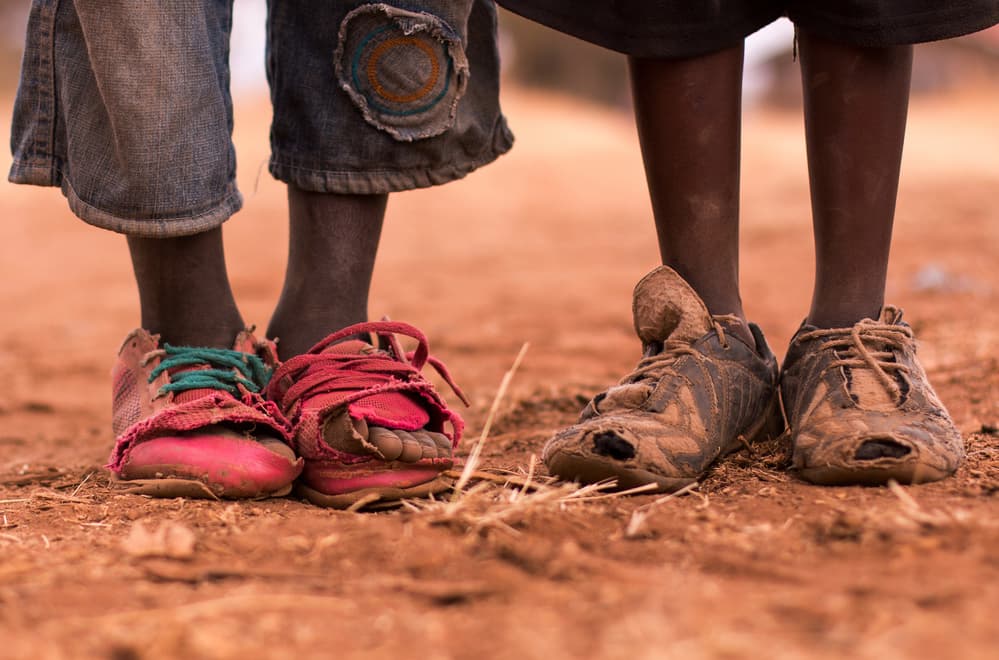 Worn Children's Shoes by Stefan Miron — canvas wall art