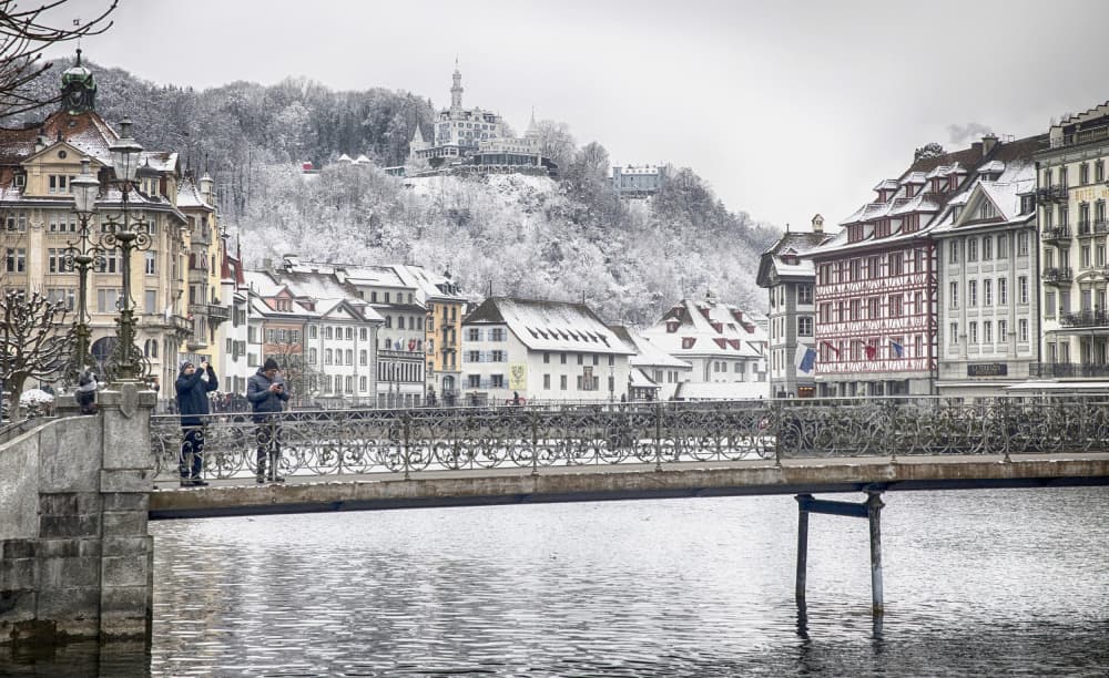Snowy Historic River Town by Angela Muliani Hartojo — canvas wall art