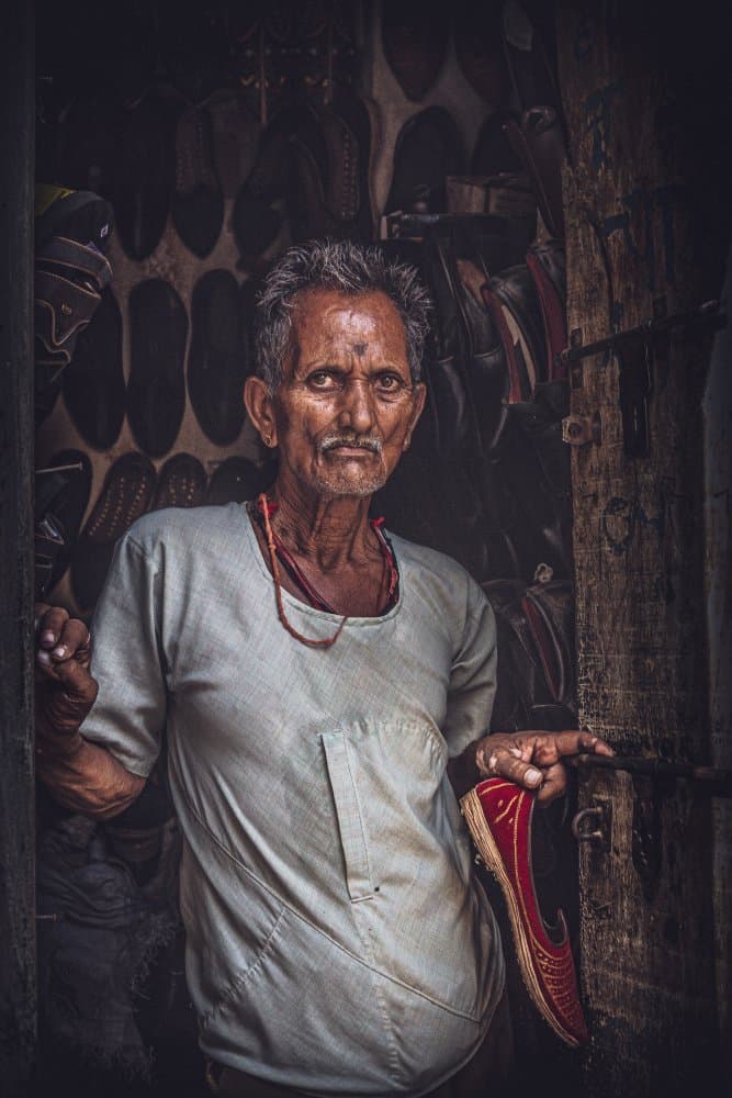 Indian Shoemaker Portrait by Marco Tagliarino — canvas wall art