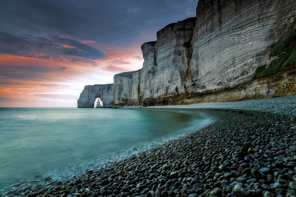 Étretat Coastal Arch Sunset by Wim Denijs — canvas wall art