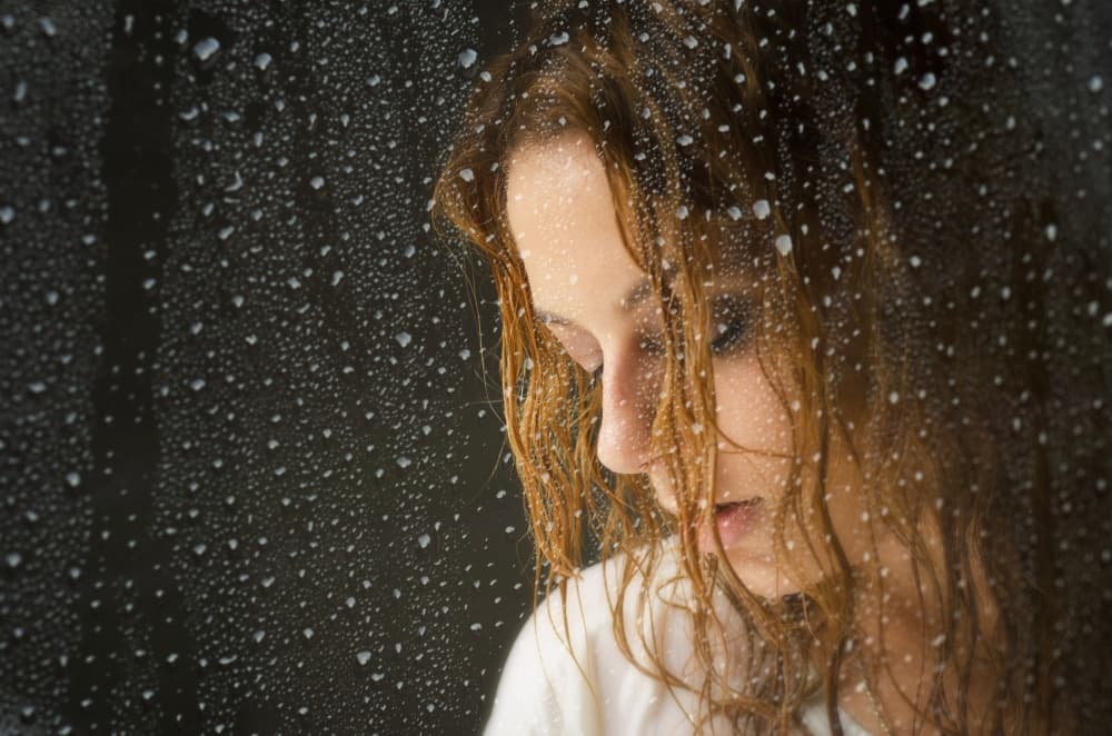Pensive Woman in Rain by Tibor Arva — canvas wall art