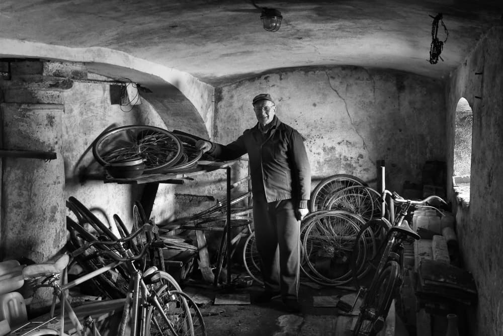 Old Man's Bicycle Shop by Bojan Kolman — canvas wall art