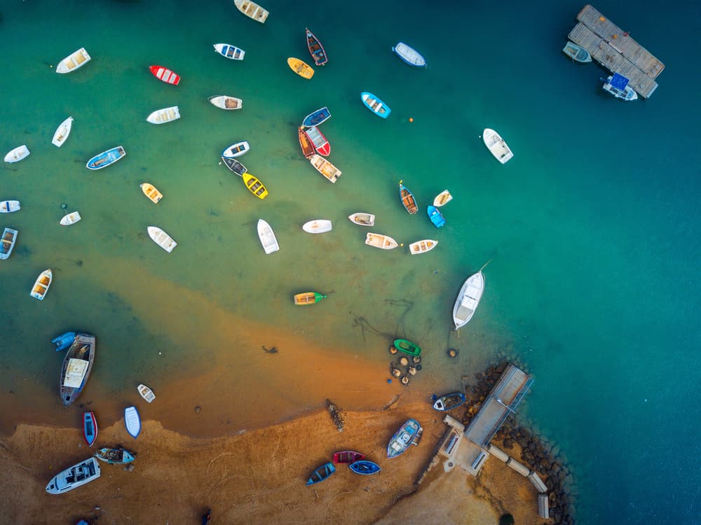Colorful Boats In Bay by Josema Martin Espinar — canvas wall art