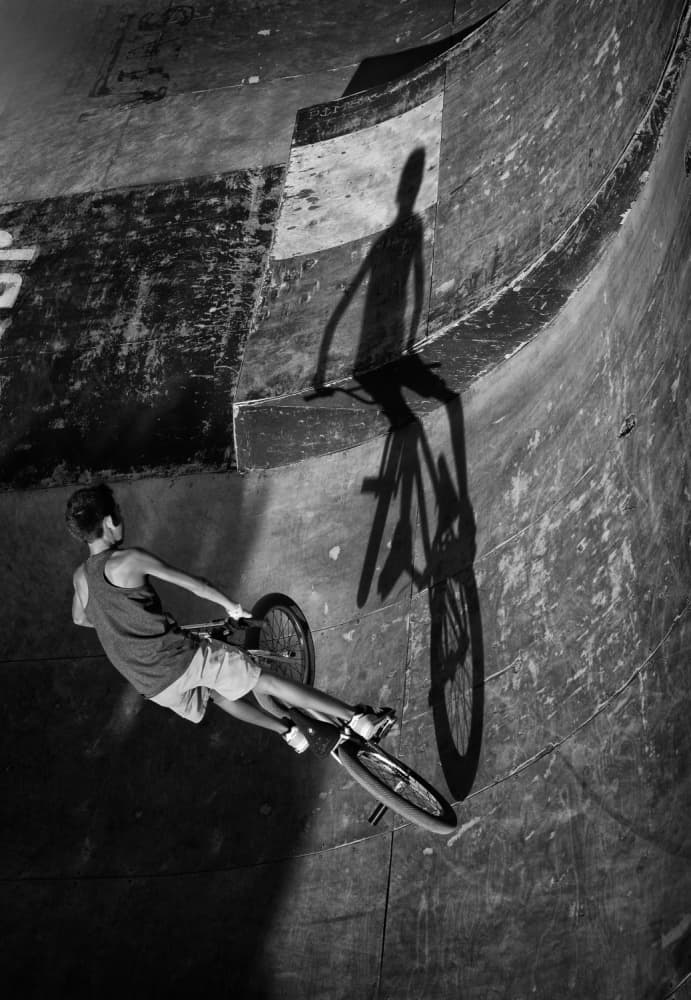 BMX Rider Shadow Play by Agostinho Teixeira — canvas wall art