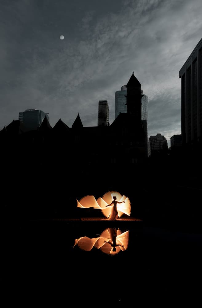 Glowing City Silhouette by Larry Deng APA — canvas wall art