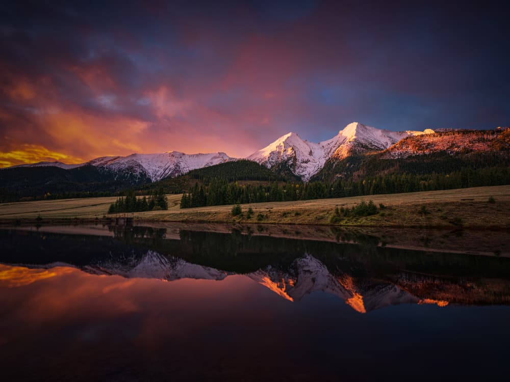 Dramatic Mountain Lake Reflection by Radek Pohnan — canvas wall art