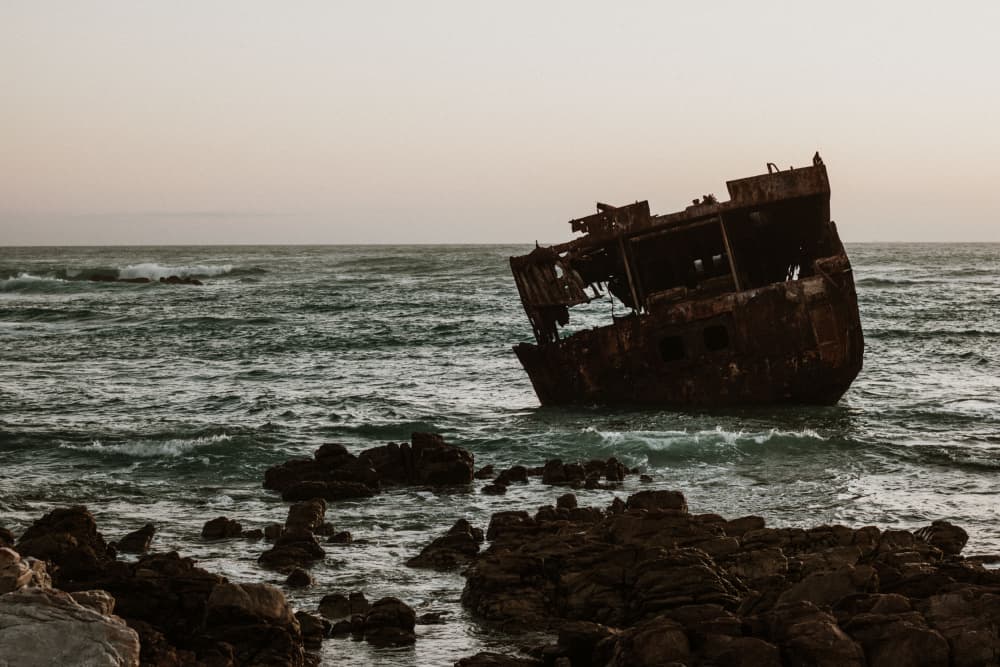 Rusted Shipwreck Ocean Waves by Megan Shone — canvas wall art