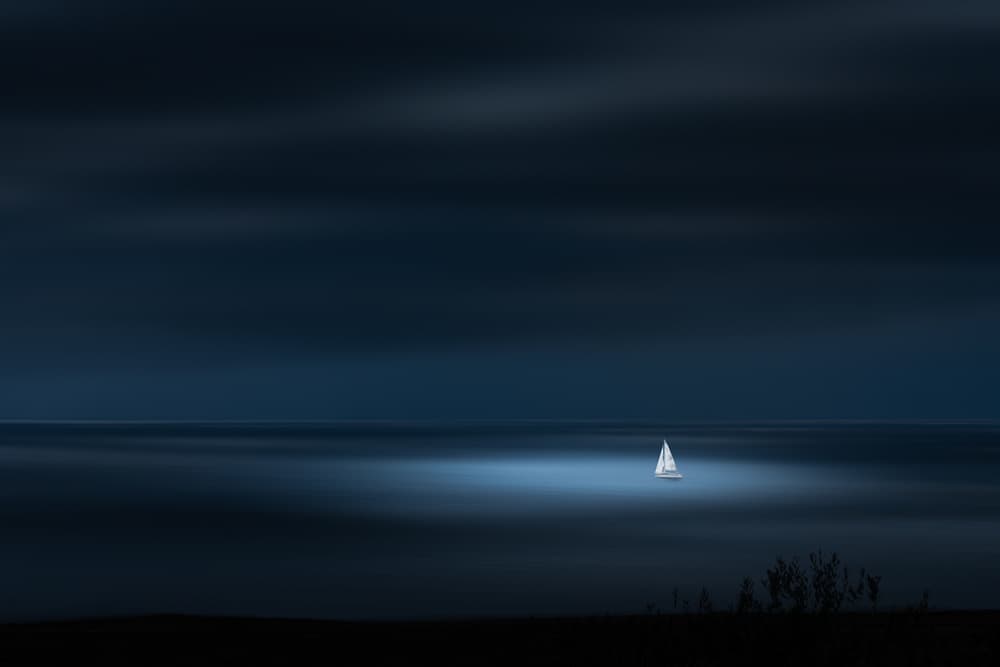Glowing Night Sailboat by James Cai — canvas wall art
