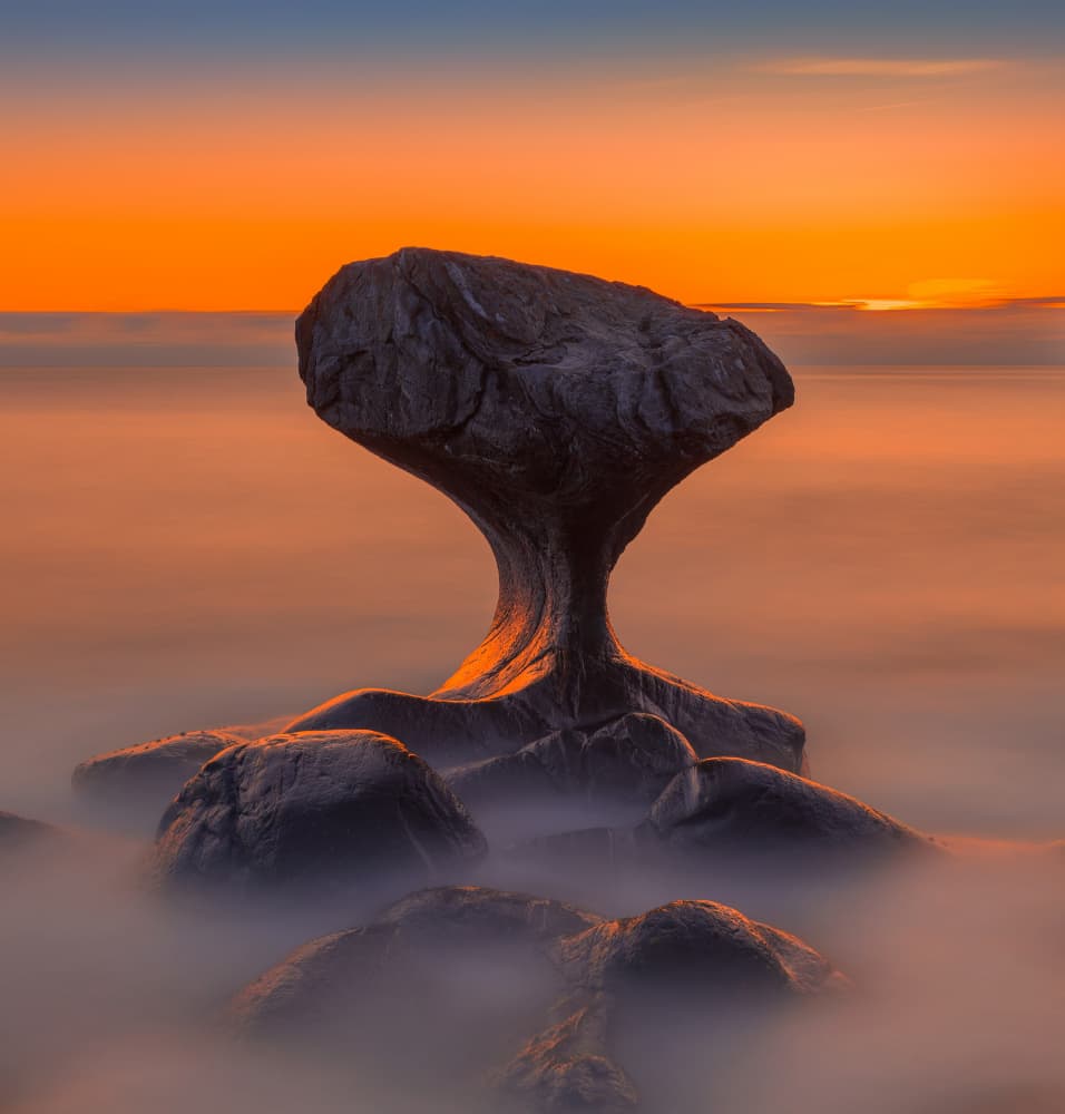Misty Ocean Rock Sunset by Rune Askeland — canvas wall art