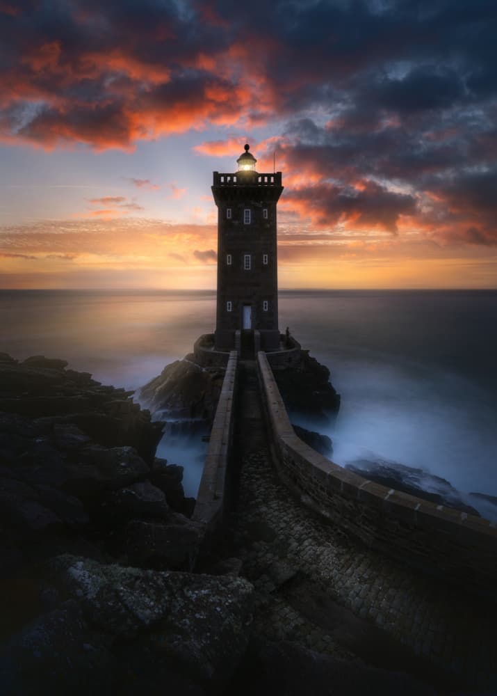 Misty Lighthouse Sunset by Remo Daut — canvas wall art